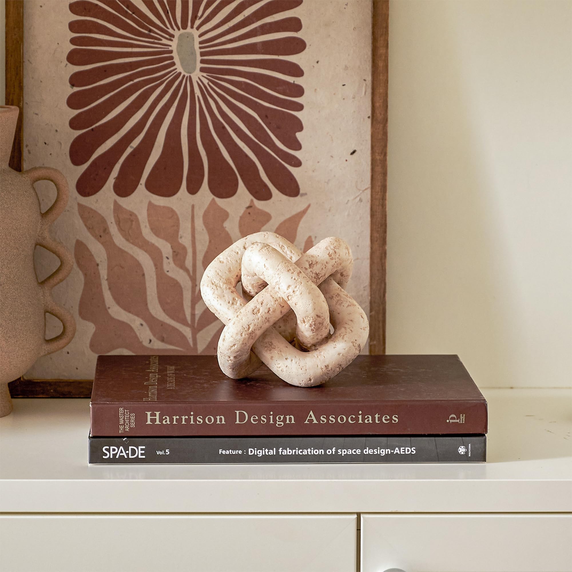 DN DECONATION 3-link knot decor beige travertine on desk, modern rustic vibe