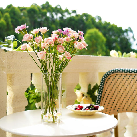 DNANAOL dining table centerpiece setup with clear cylinders