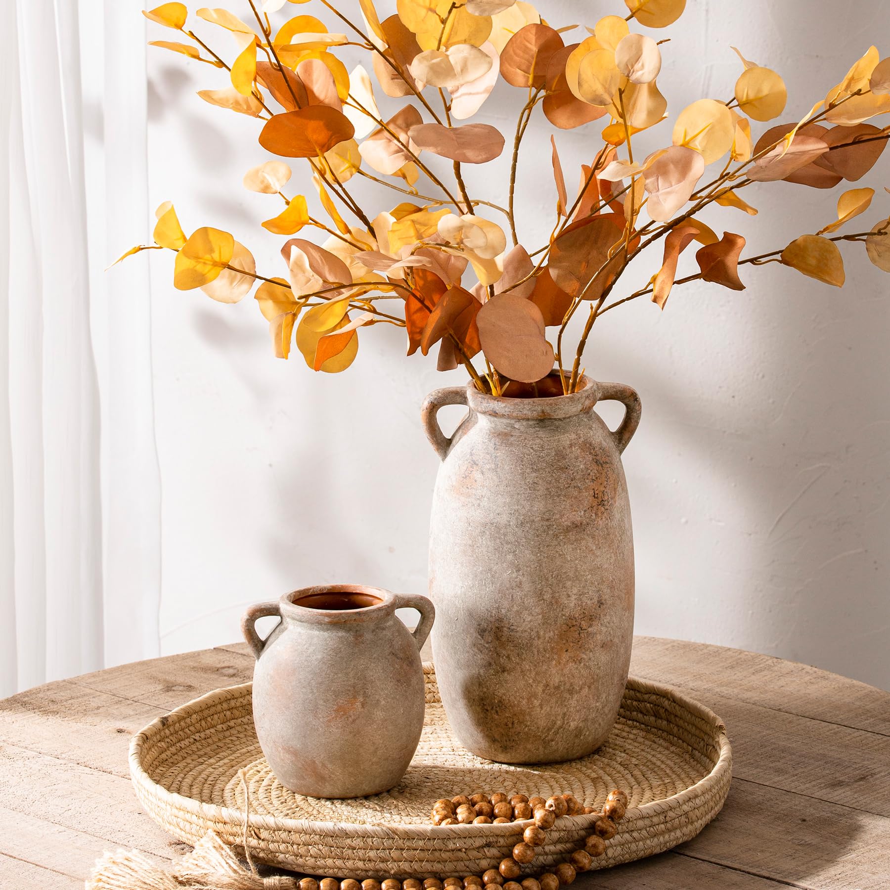 Dobbyby boho farmhouse adaptable vase fits multiple room styles.