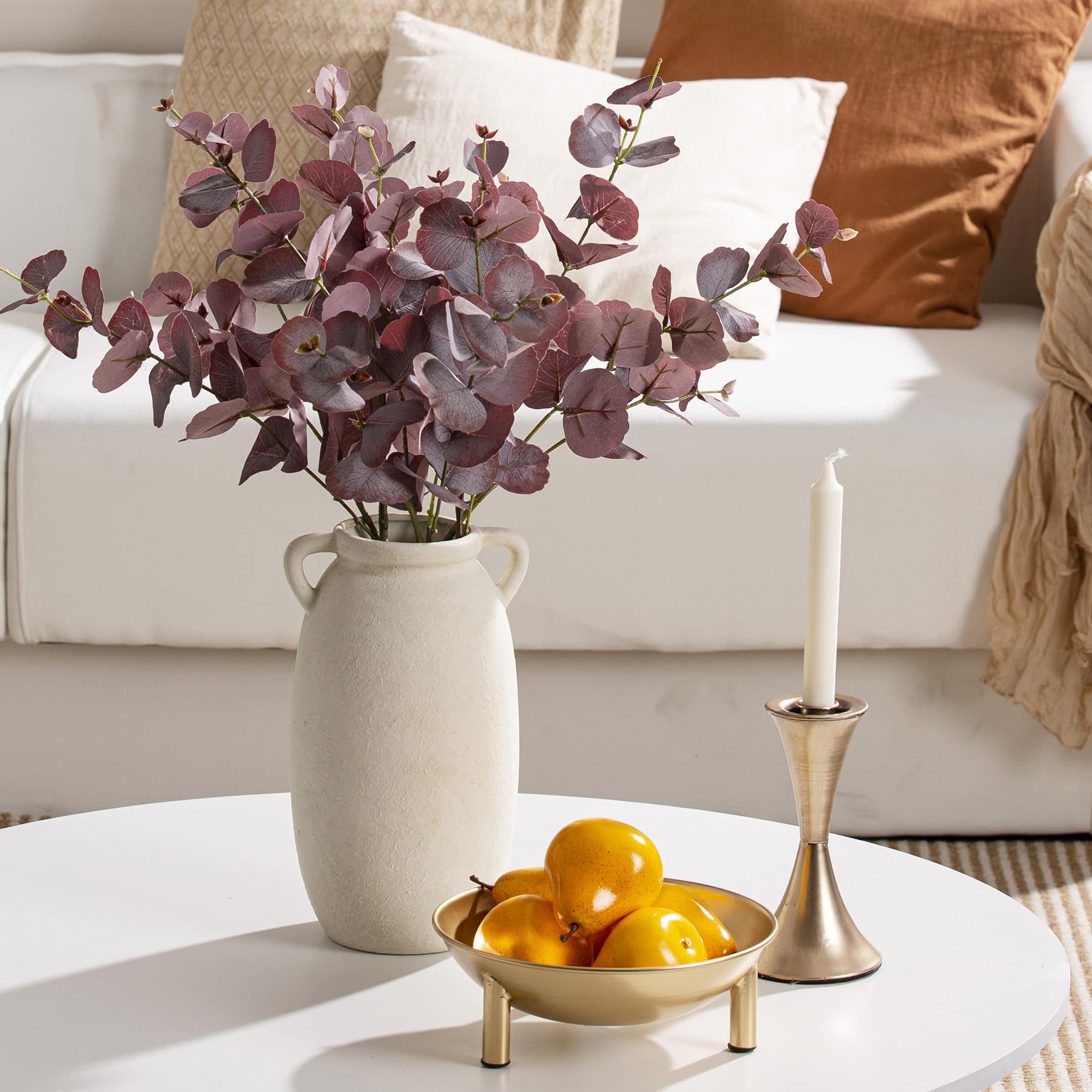 Dobbyby vase on mantel with complementary decor.