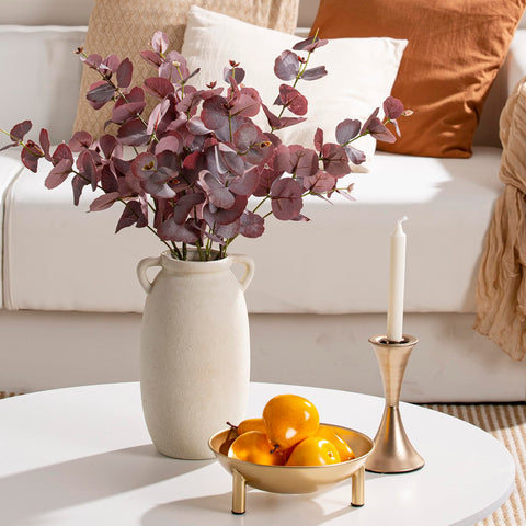 Dobbyby vase on mantel with complementary decor.
