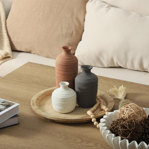 Dobbyby ceramic vase set arrangement on mantel with decorative stems