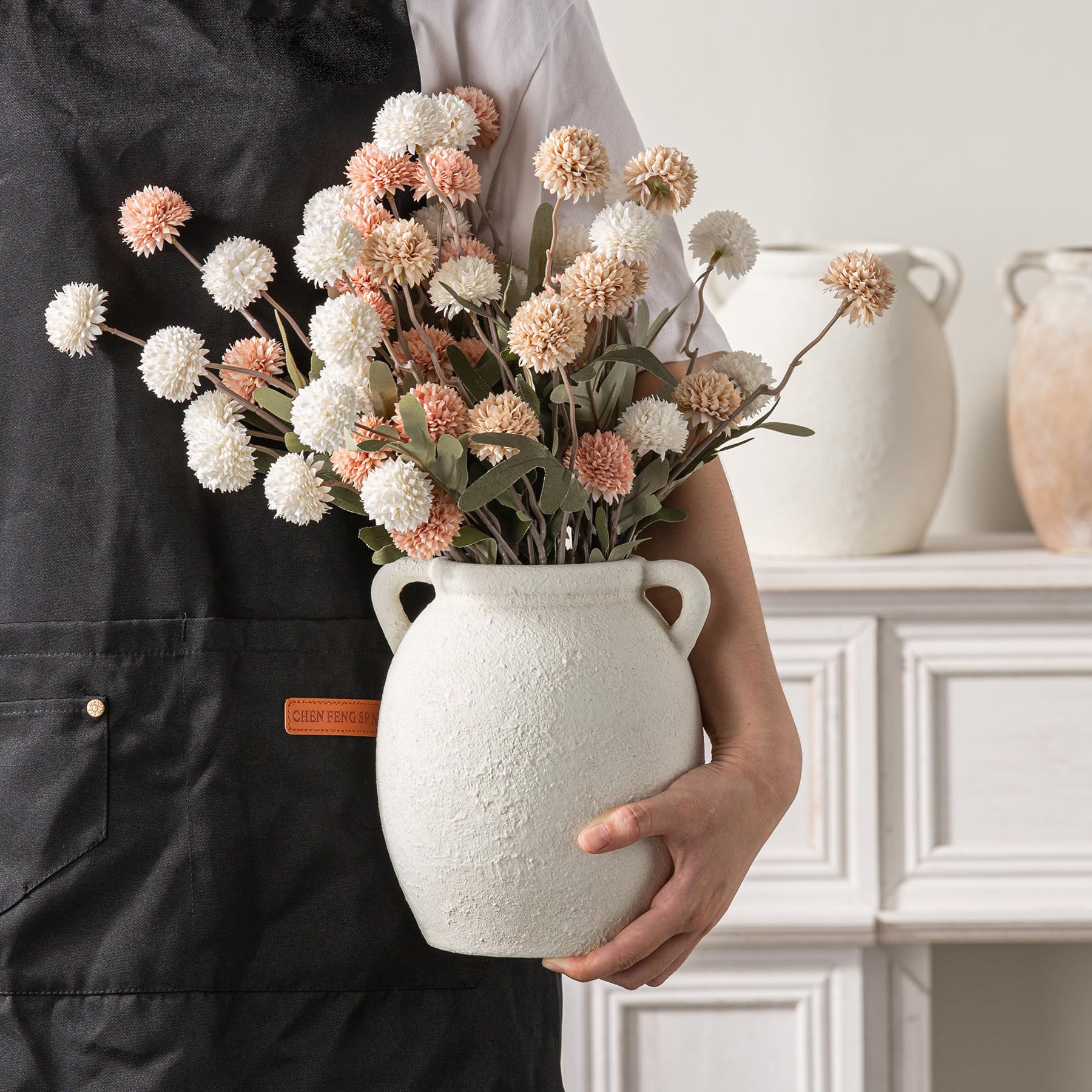 Dobbyby hand-painted ceramic detail highlighting artisanal texture.