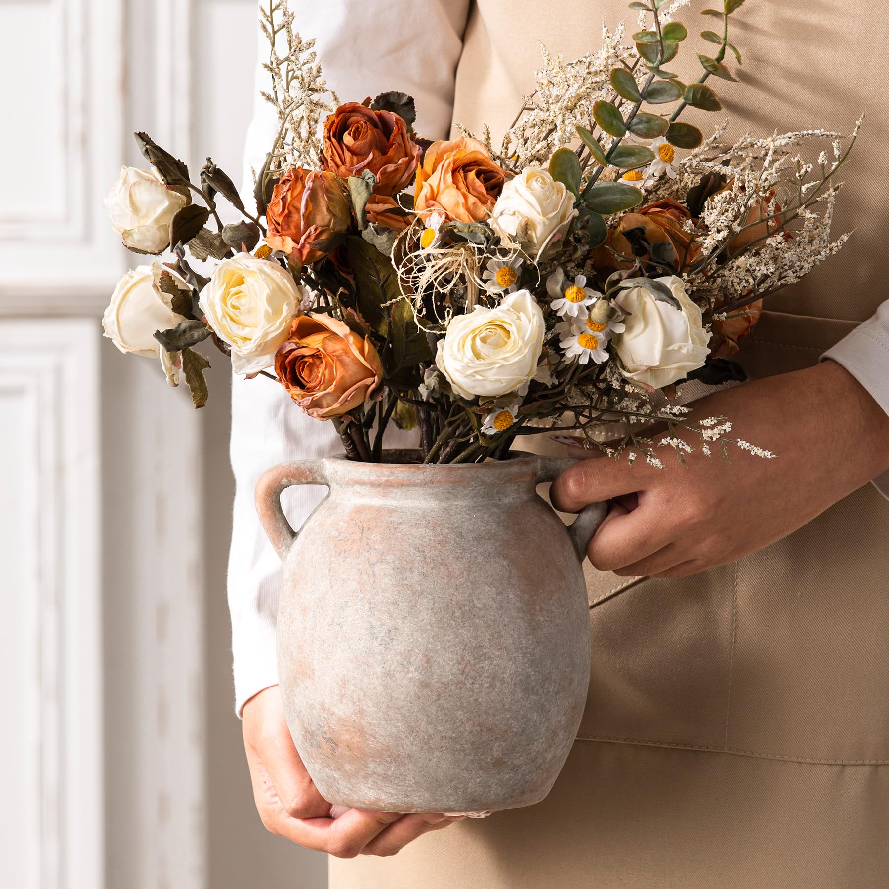Dobbyby rustic terracotta finish vase enhances farmhouse or boho decor.