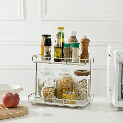 Dobbyby silver-gold shelf blends modern metal with white marble accents.