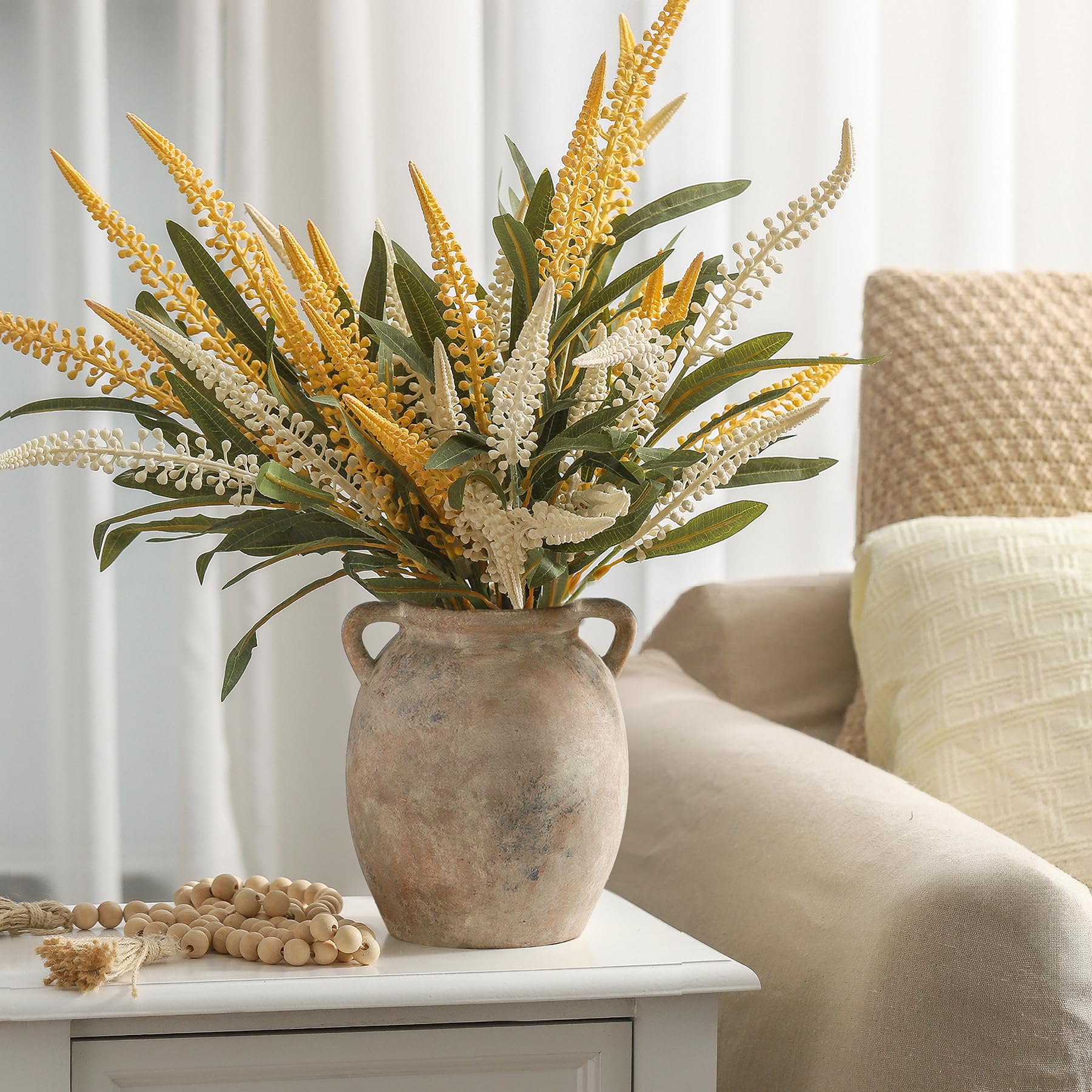 Dobbyby vase with dried florals creating a cozy display