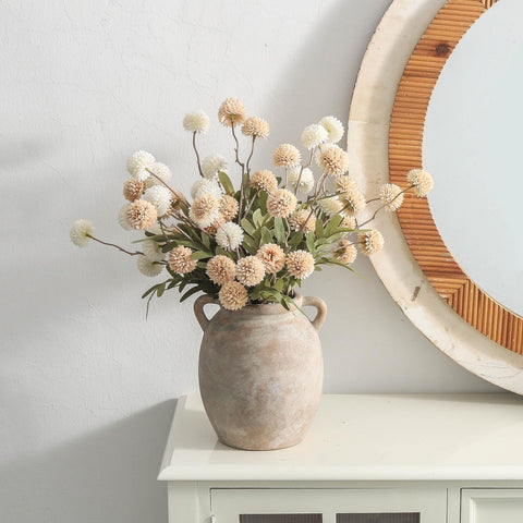 Dobbyby vase on a living room mantle adding warmth