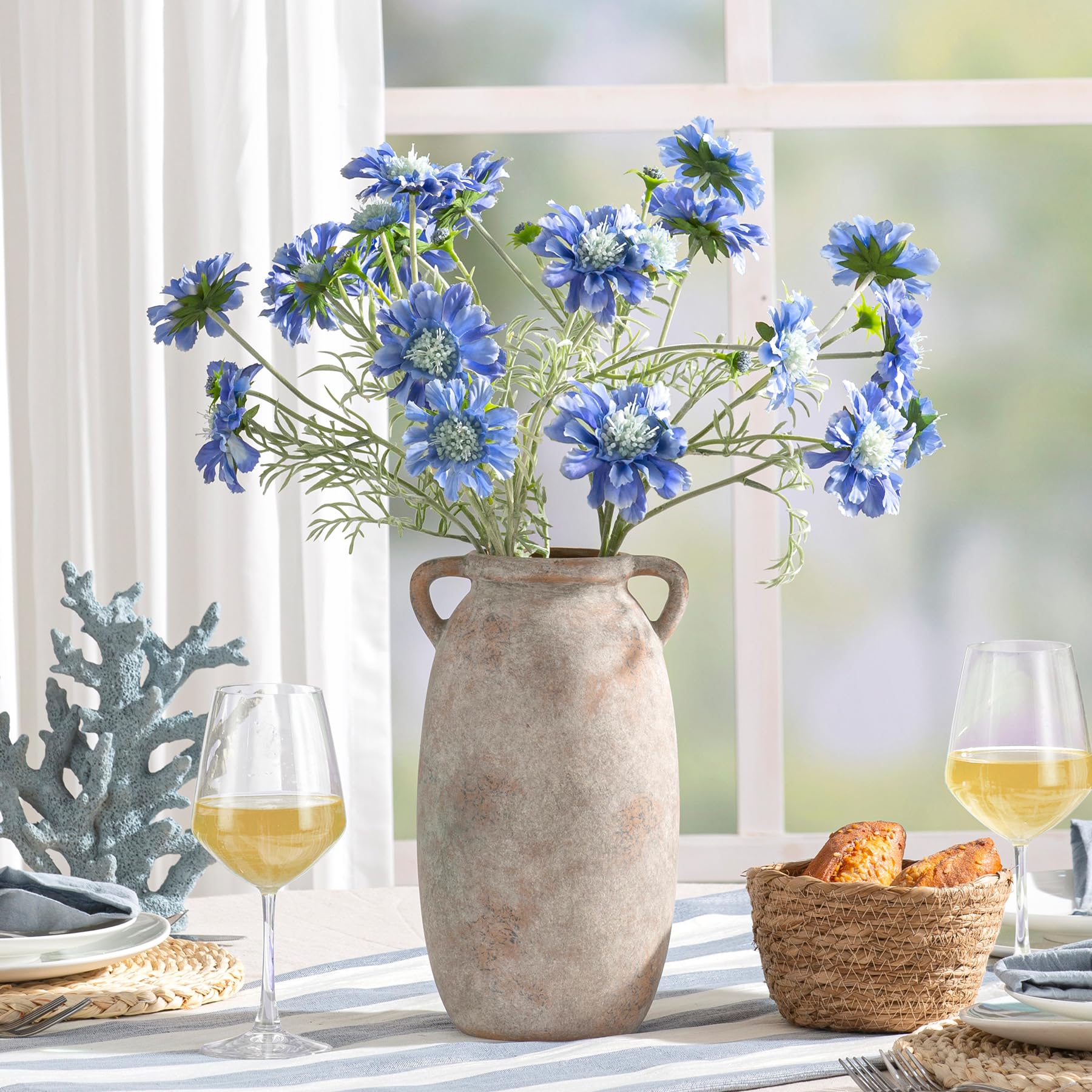 Dobbyby vase used as utensil holder or decorative shelf accent.