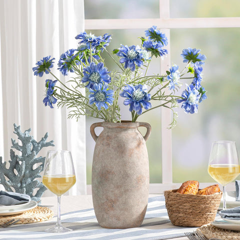 Dobbyby vase used as utensil holder or decorative shelf accent.