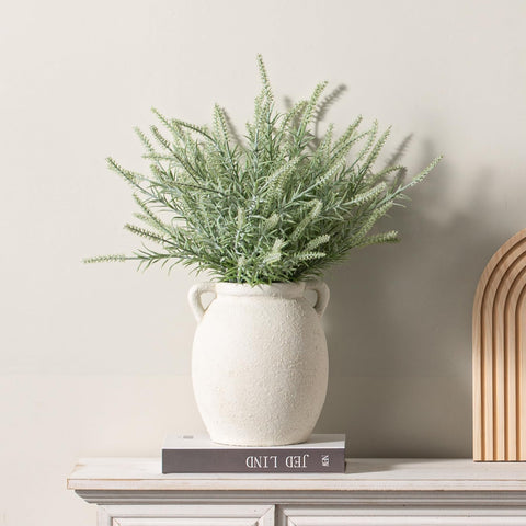Dobbyby vase used as utensil holder with rustic charm.