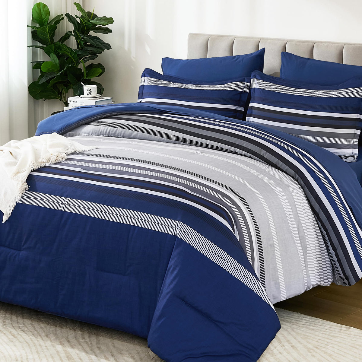 Dobuyly navy blue comforter full set in microfiber offers lightweight warmth and softness.