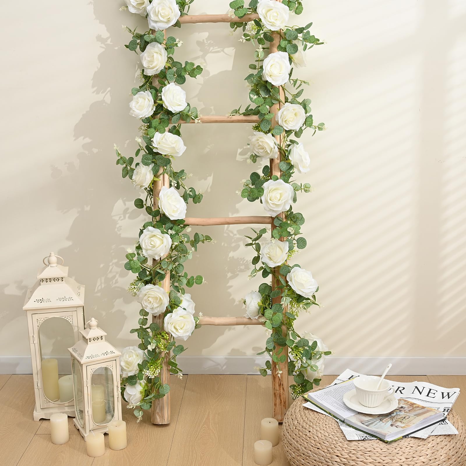 Dolicer wedding backdrop garland with eucalyptus and roses.