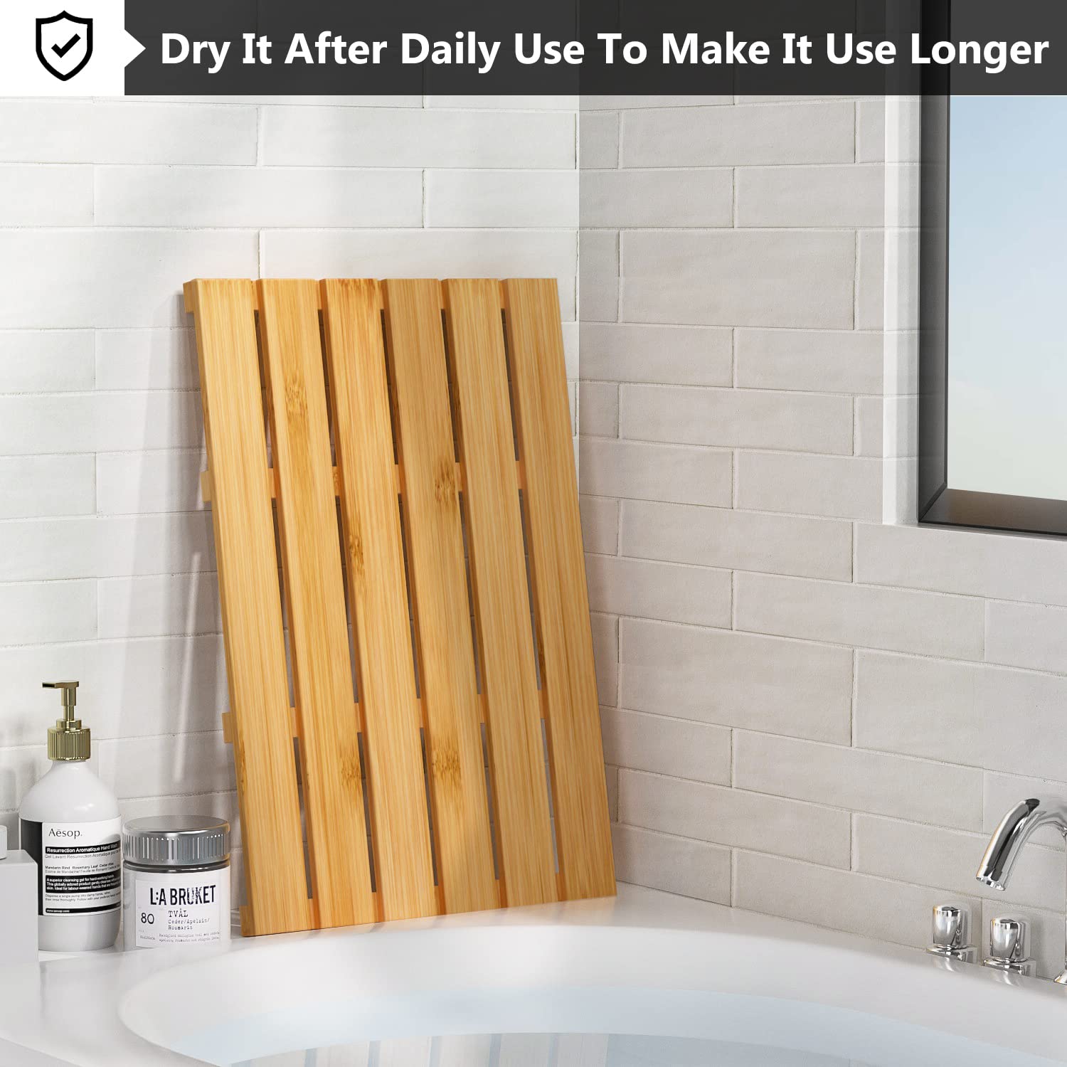 Domax Bamboo Bath Mat with slotted design drains quickly after use