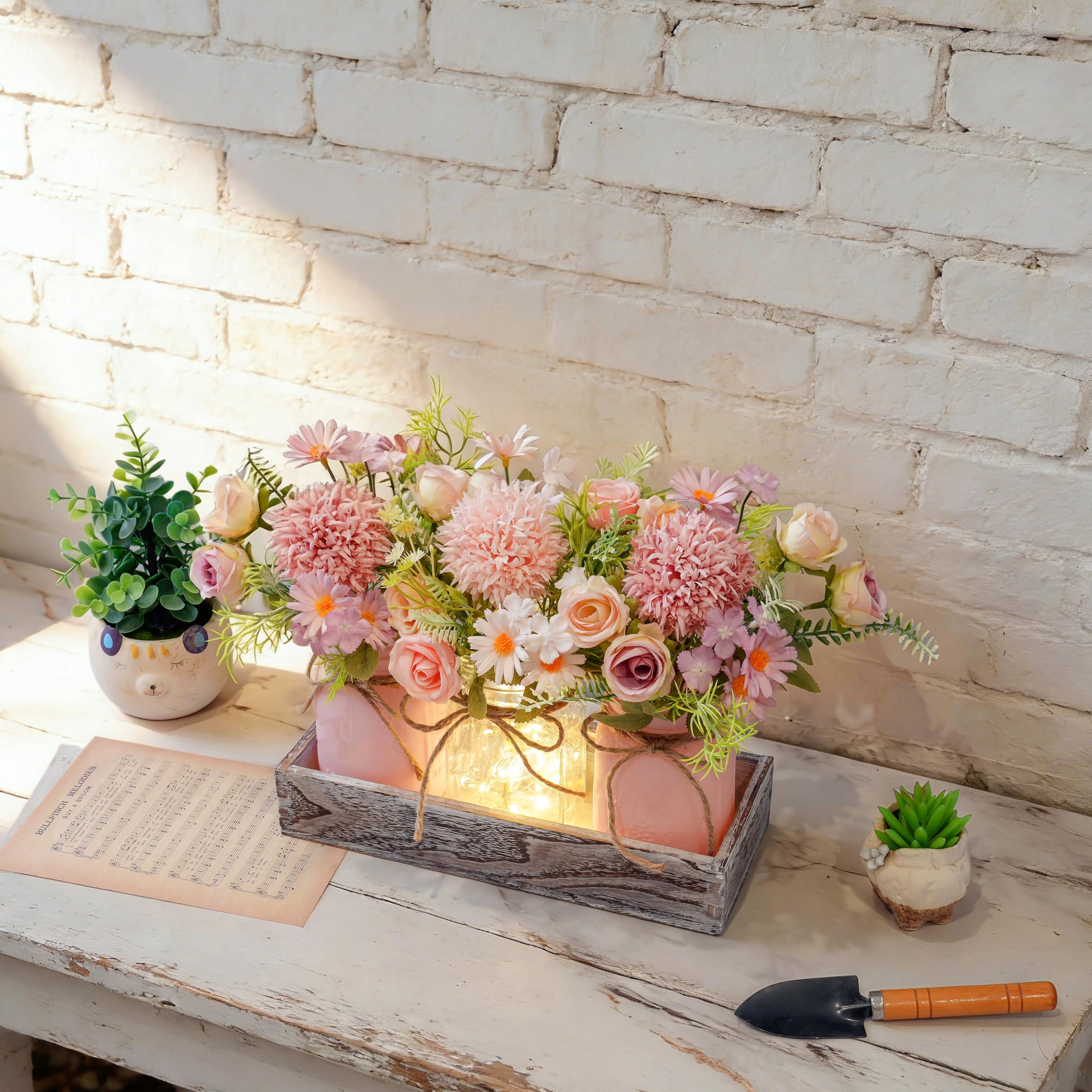 Donmills pink-and-purple spring flowers centerpiece adds soft romantic color to living spaces