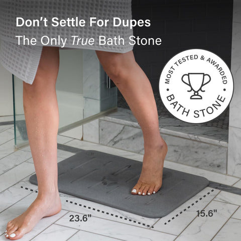 Dorai Stone Bath Mat is easy to wipe clean and quick-dry.
