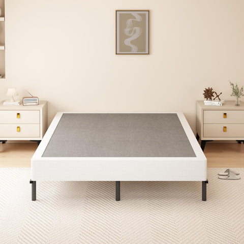 DORITRON bedroom setup shows a stable queen box spring providing a solid foundation.