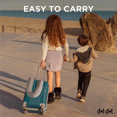 Dot&Dot Twist Memory Foam Kids Travel Pillow rolled-car-seat-use demonstrates secure travel on the go.