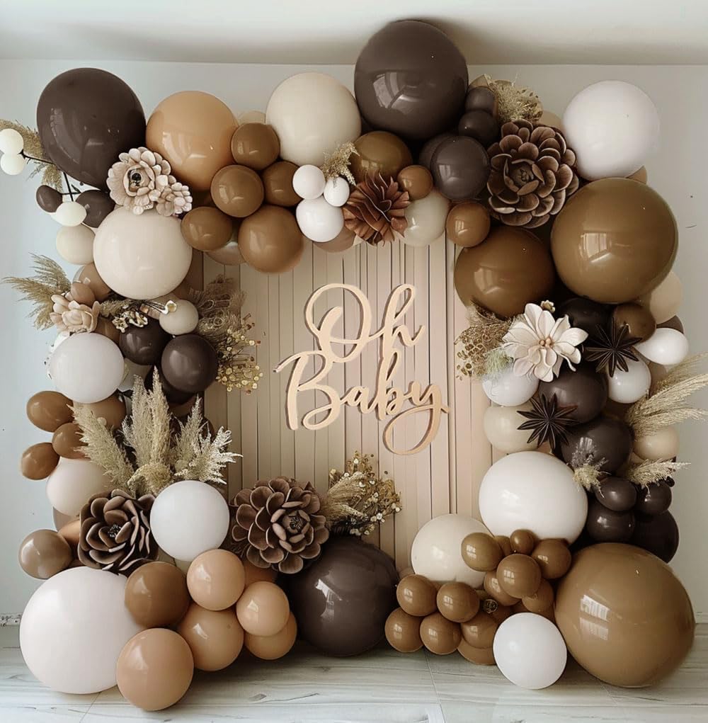 DOUBLE LAYER BALLOON arch featuring white sand and cream balloons for neutral styling.
