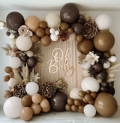 DOUBLE LAYER BALLOON arch featuring white sand and cream balloons for neutral styling.