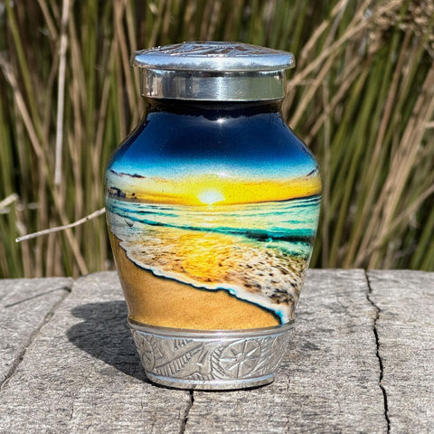 Double Trouble Waves on the Beach Keepsake Urn displayed as a seascape memorial for personal remembrance