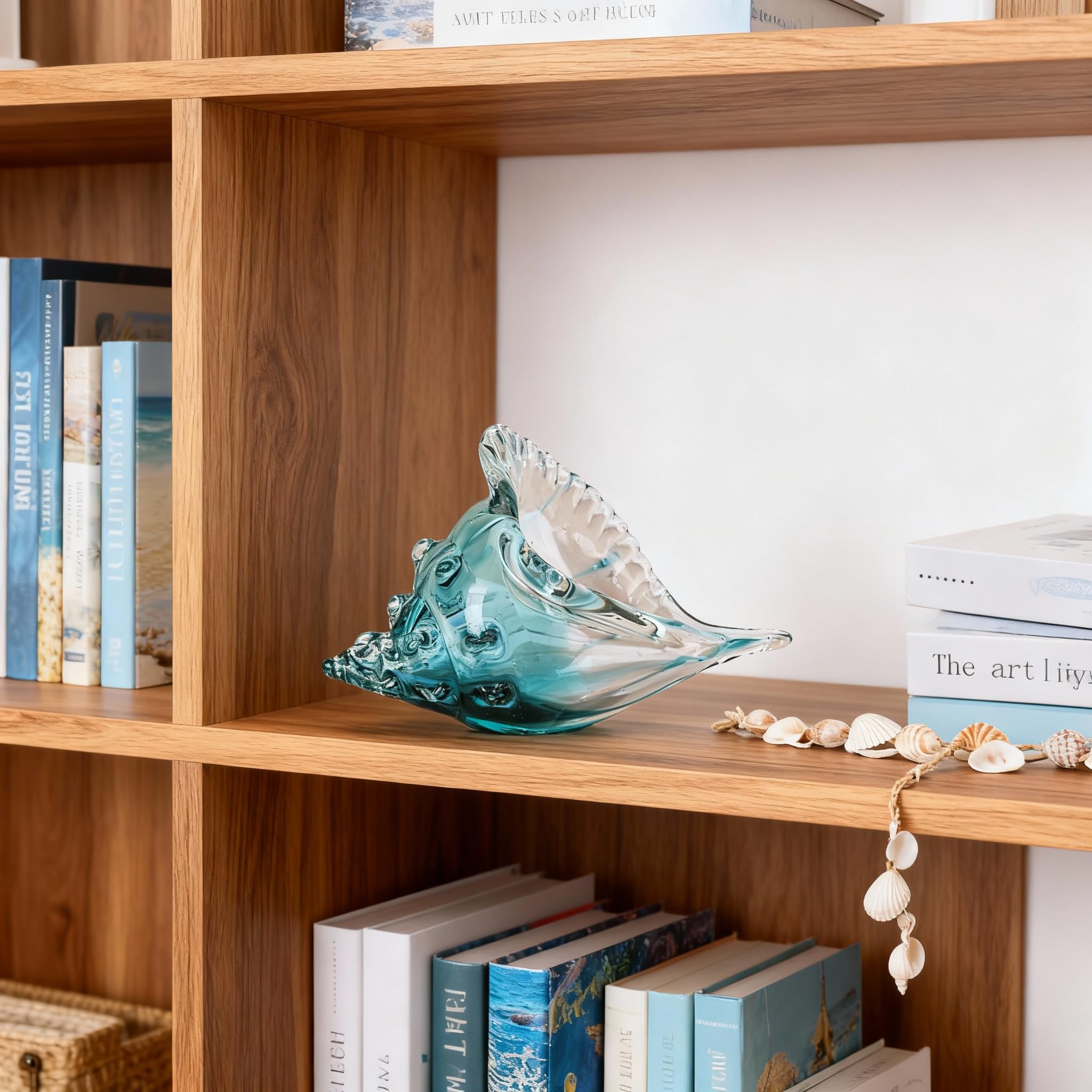 DOVDOV hand-blown conch Ocean Blue highlights calming sea tones.