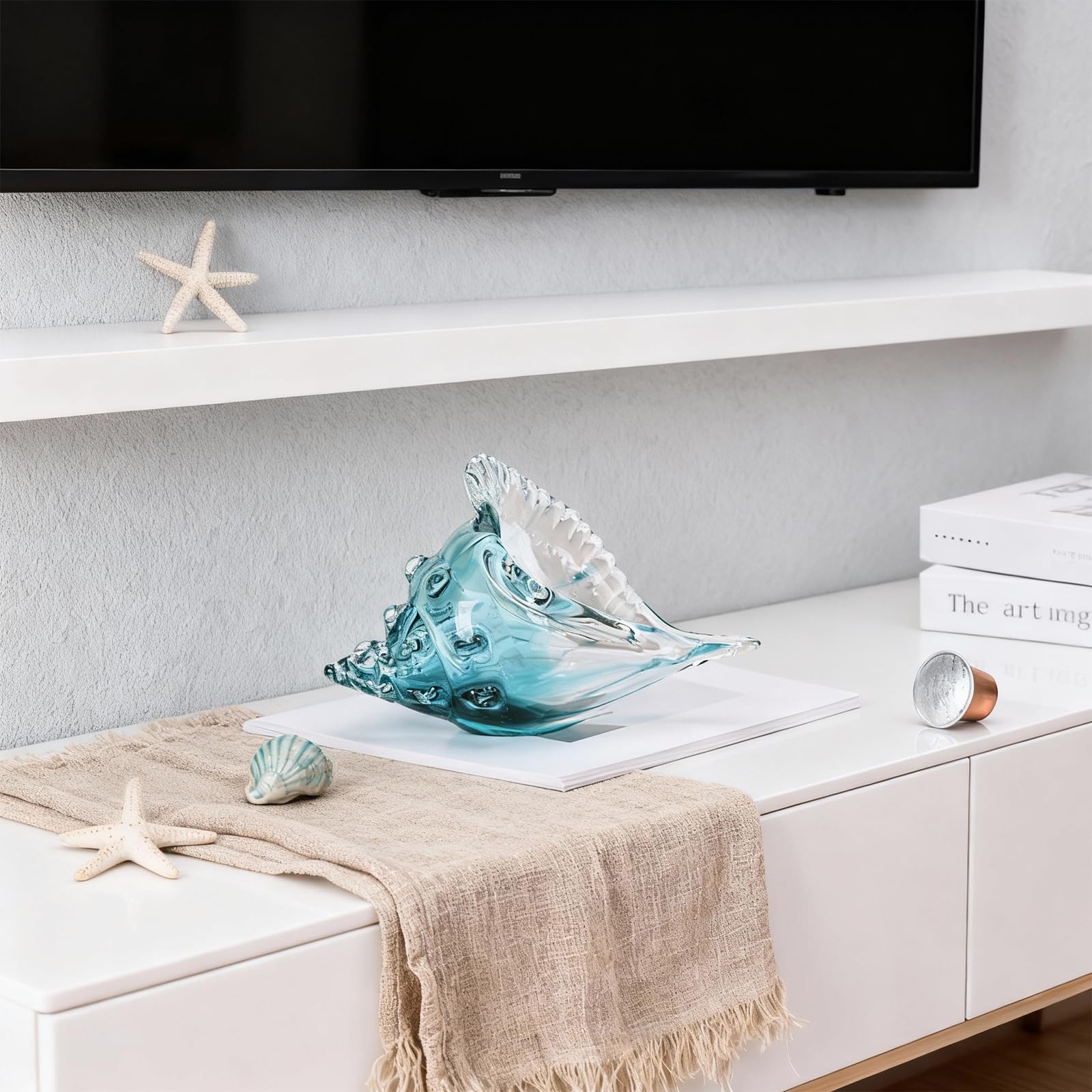DOVDOV hand-blown conch striped green adds vibrant marine texture to shelves.