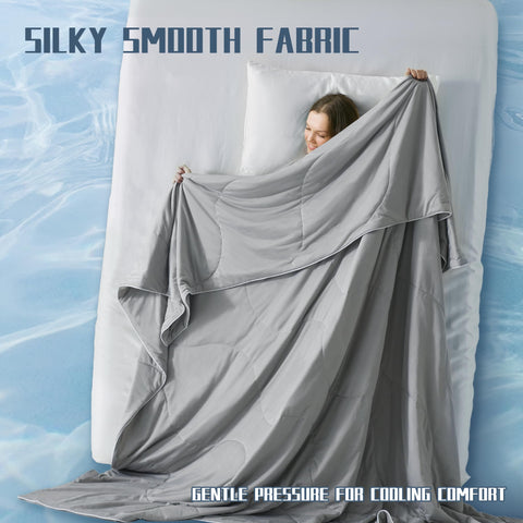 Downcool cooling comforter on bed scene in a warm room