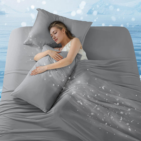 Downcool four-piece set including two pillowcases for a coordinated sleep.