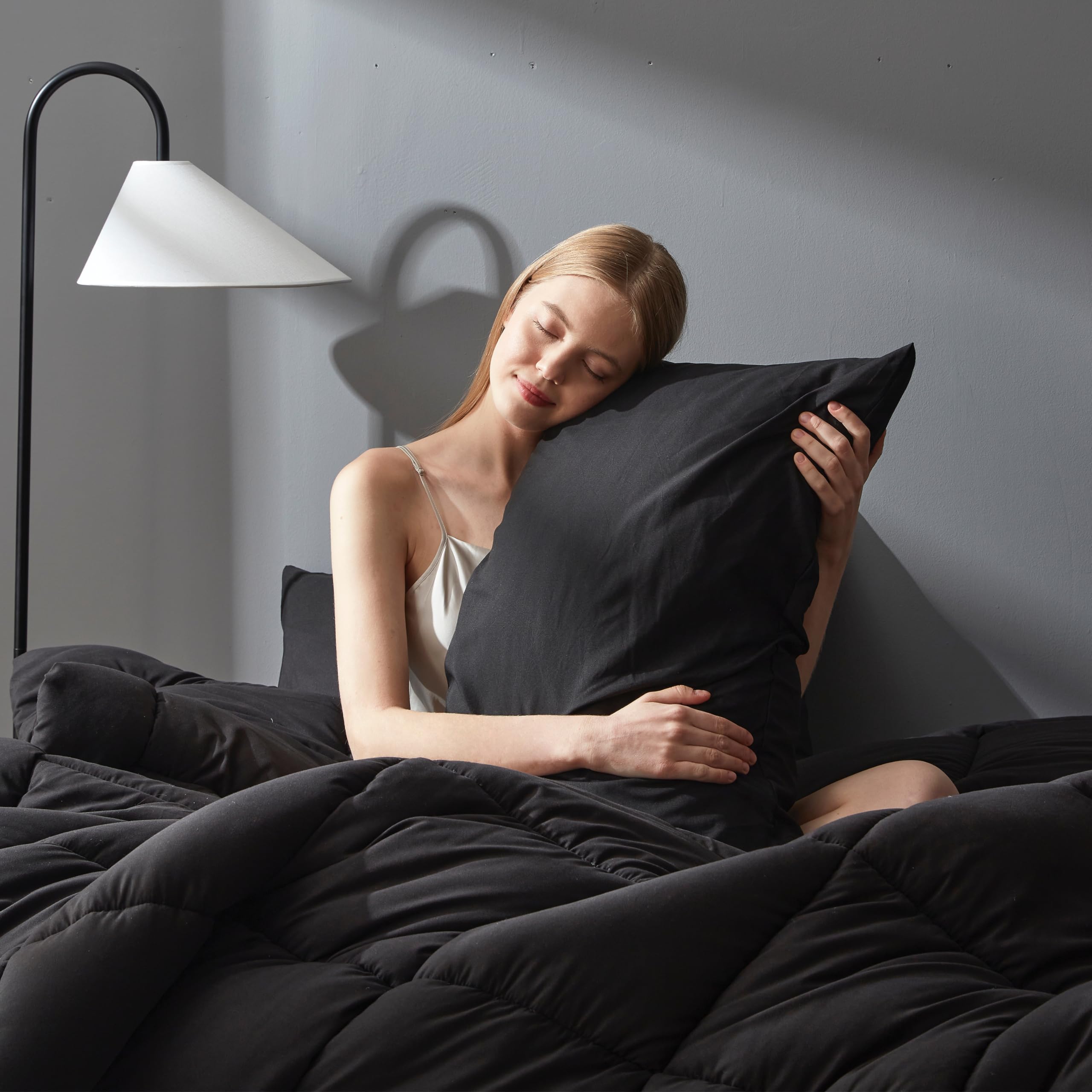 DOWNCOOL pillowcases included complete the coordinated bedding look.