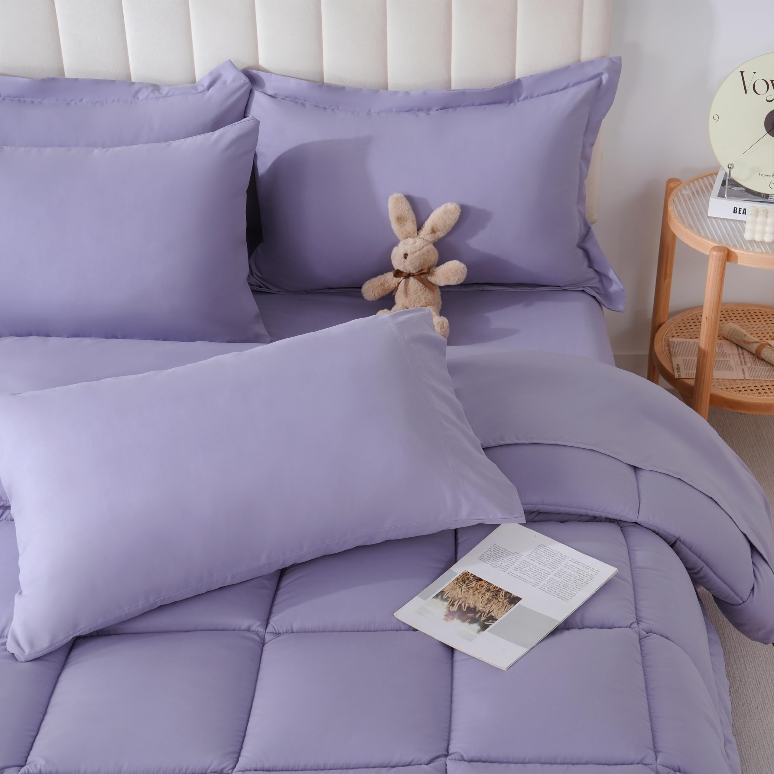 Downcool full-size comforter set in purple with even stitching for durable warmth.