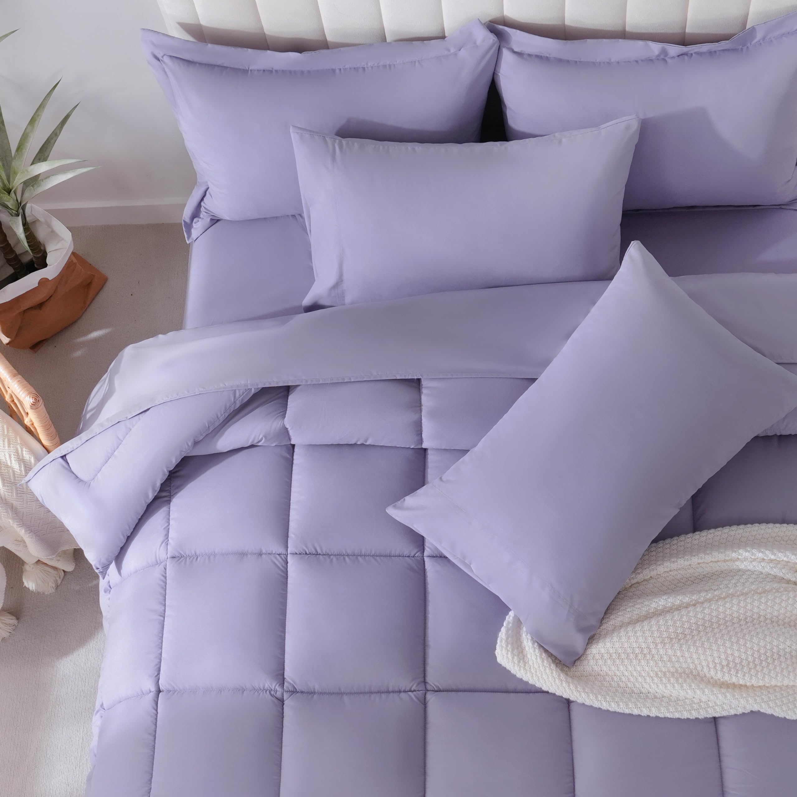 Downcool purple fitted sheet delivers snug fit and easy care.