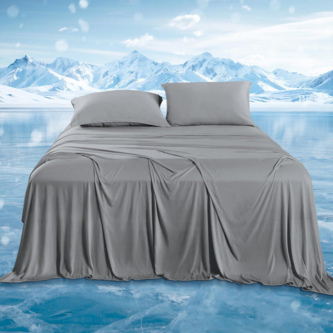 Downcool queen cooling sheets on bed deliver instant cool comfort.