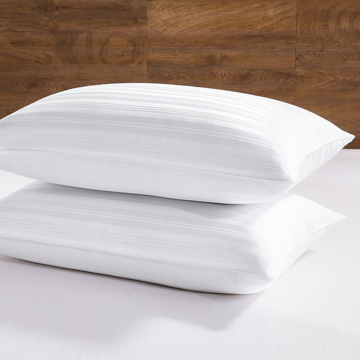 Downluxe goose feather pillow, front view, plush comfort for all sleep positions.