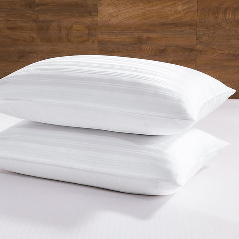 Downluxe goose feather pillow, king size 20x36, breathable lyocell cover for all-season comfort.