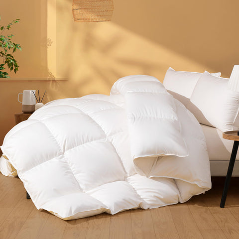 DOWNSTORIA Feather Down Fiber Comforter on an oversized king bed with plush warmth.