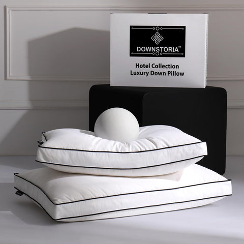 DOWNSTORIA feather down pillow queen 2-pack with gusset for plush neck support.