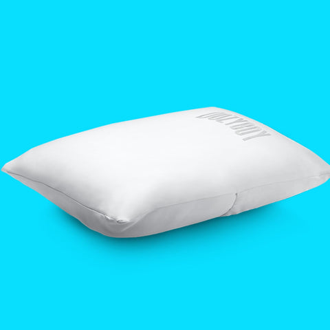 DozyBoy Fluff and Stuff Comfort Pillow cooling-technology angle shows cool-to-the-touch feel.