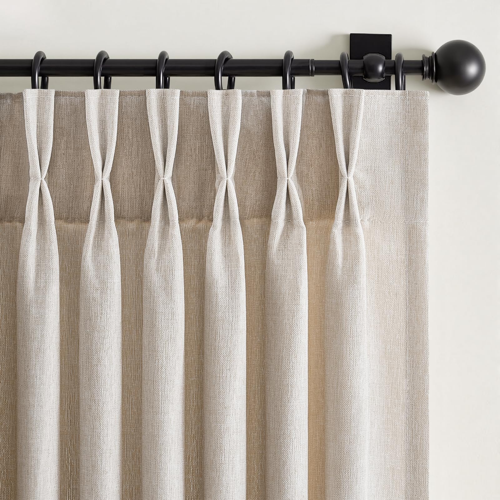 Drapenova natural pinch-pleat curtains with elegant, structured drape.