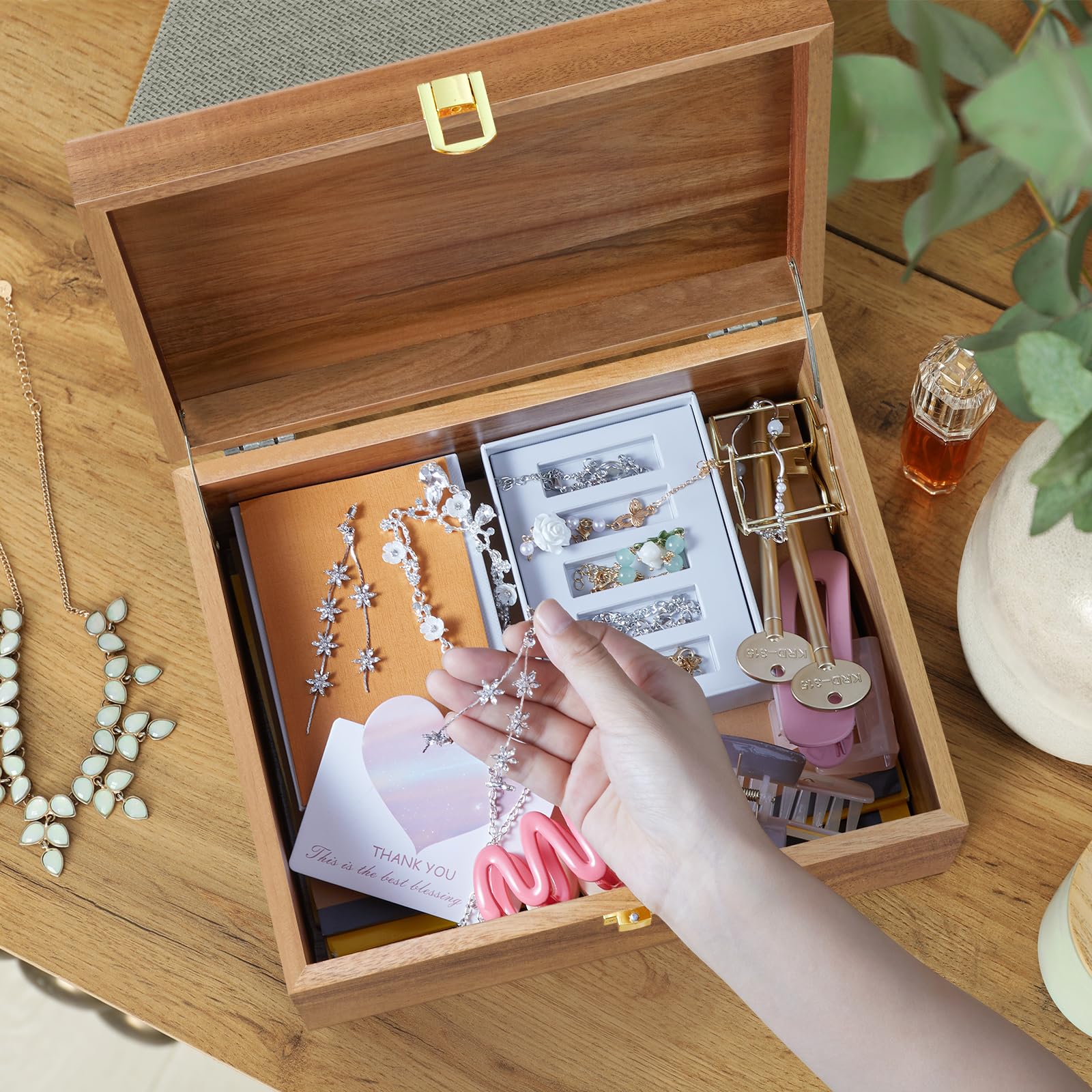 DRASTAR minimalist design complements decor while organizing treasured items