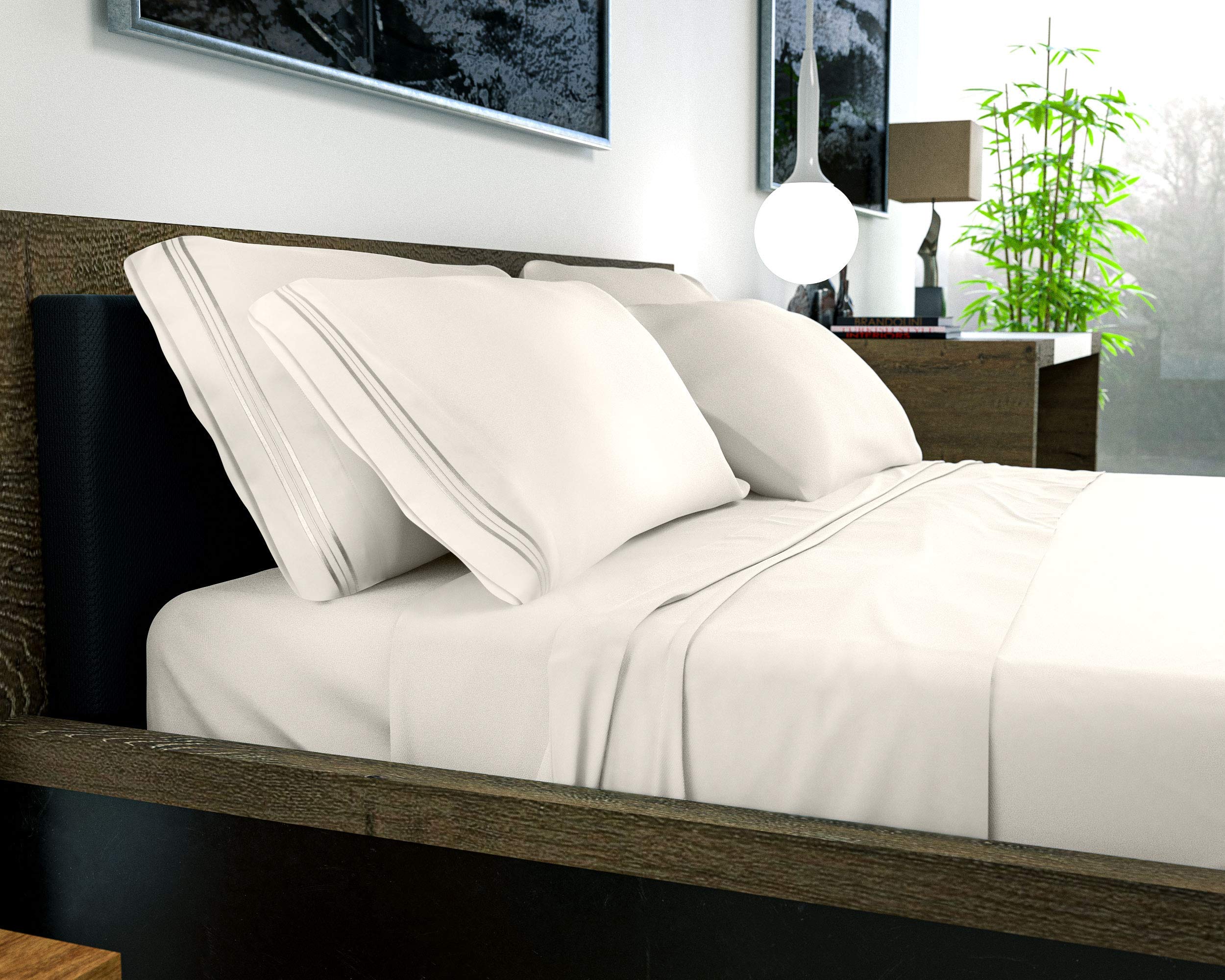 Bed scene highlights hotel-luxury vibe with everyday home practicality.