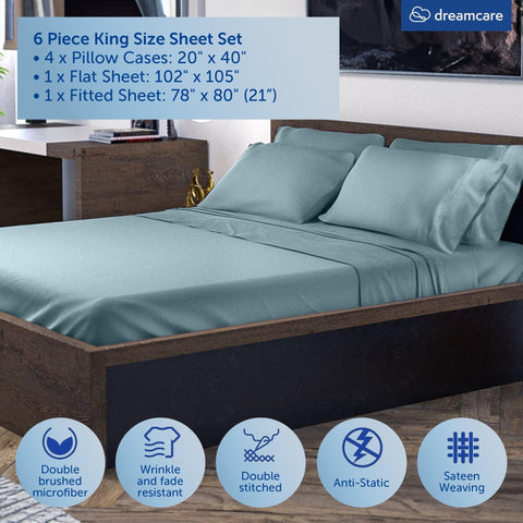 DREAMCARE fitted sheet side pocket detail ideal for phone or remote control.