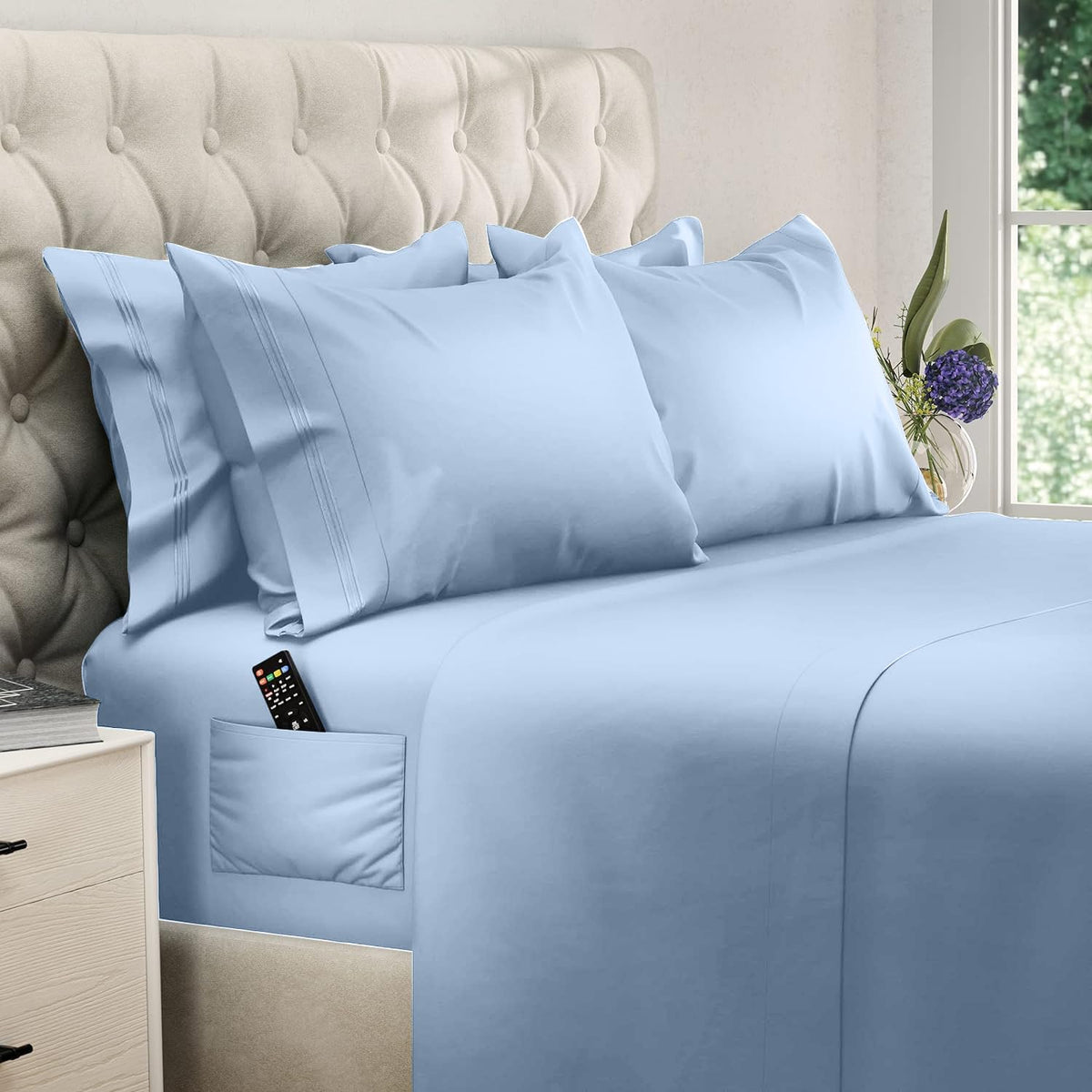 DreamCare king size sheets side pocket closeup for easy access to essentials.
