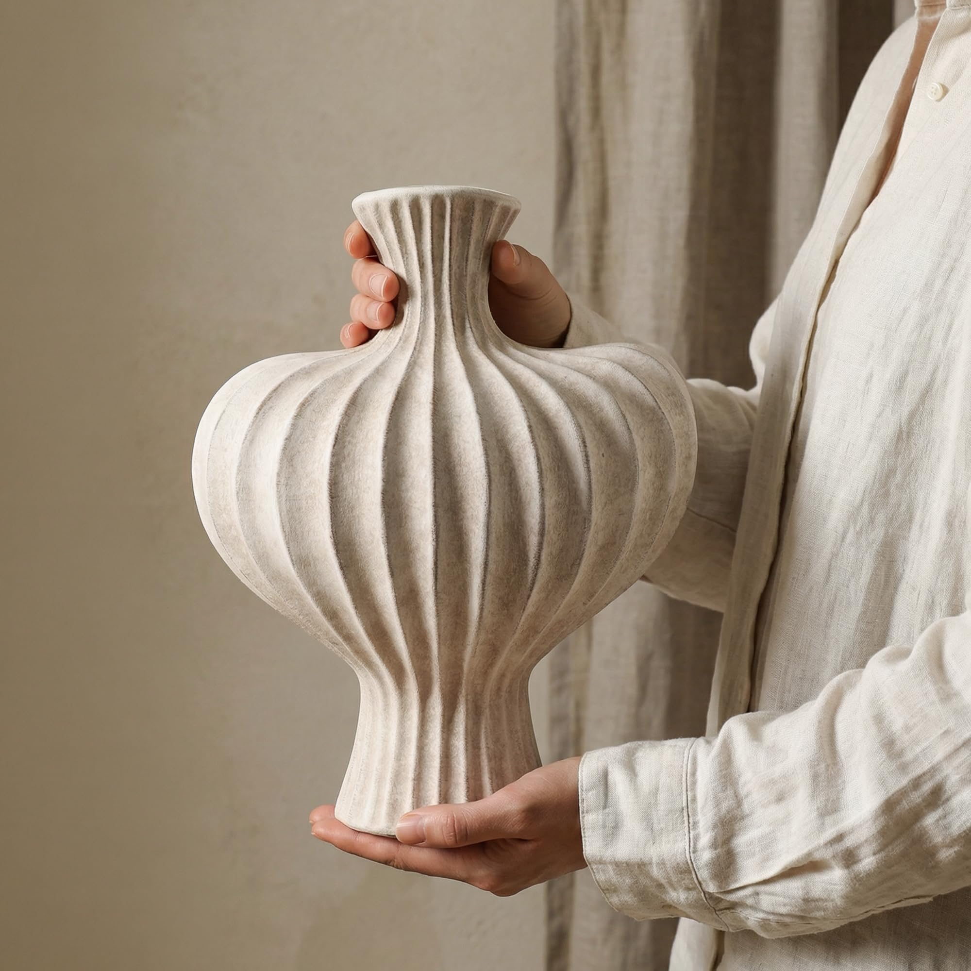 DREAMLOOM waterproof-treated ceramic vase with sturdy base protects surfaces.