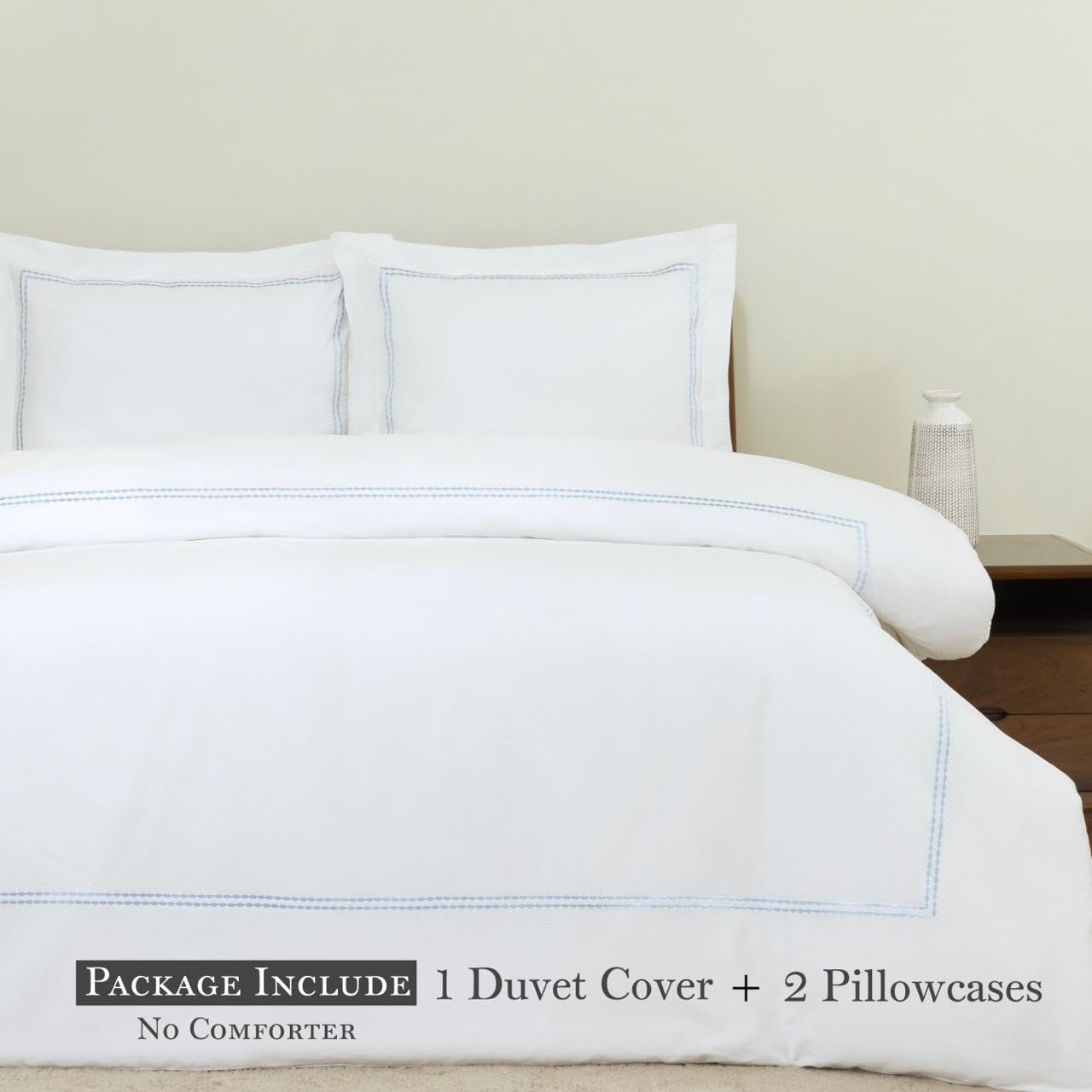 Dreamology embroidery detail on duvet cover highlighting refined stitching