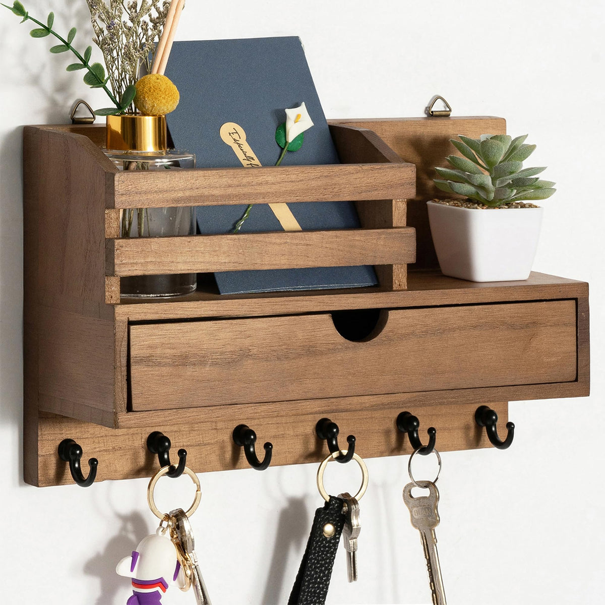 Dreampossible key and mail holder wall with six hooks and a drawer for organized entryway.