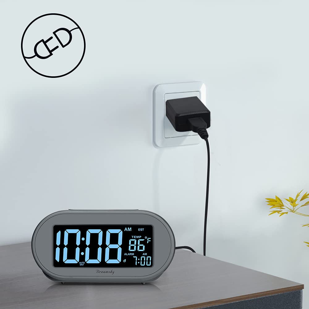 DreamSky clock USB port powers the clock while charging a device.