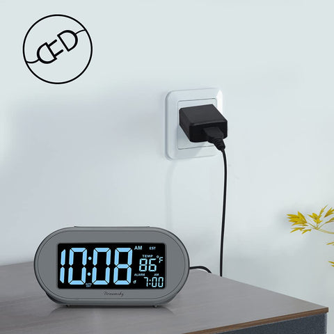 DreamSky clock USB port powers the clock while charging a device.