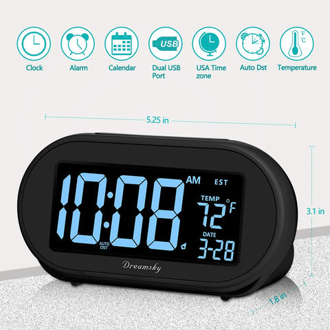 DreamSky bedside clock shown on a nightstand beside a lamp and phone.