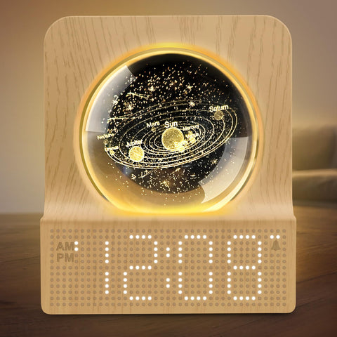 DreamSky Space Alarm Clock on a kid's nightstand with a decorative crystal ball.