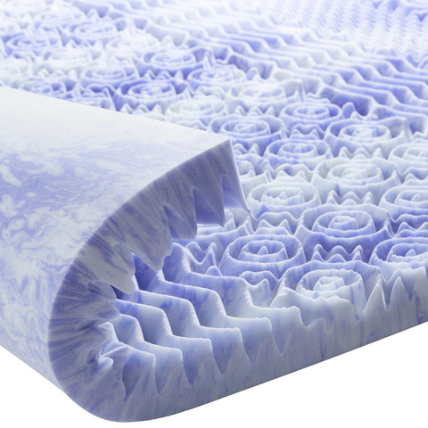 Dreamsmith queen topper close-up shows foam texture delivering cooling comfort.